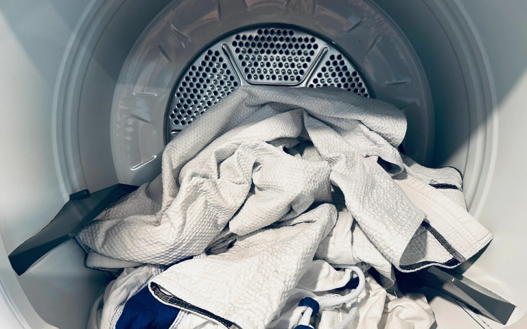 BJJ gis inside of a laundry machine